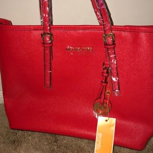 MICHAEL KOHRS RED BAG